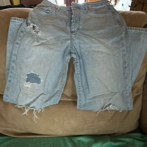 Woman’s size 26, Forever 21 Jeans 2 one blue, one black with ripped knees.